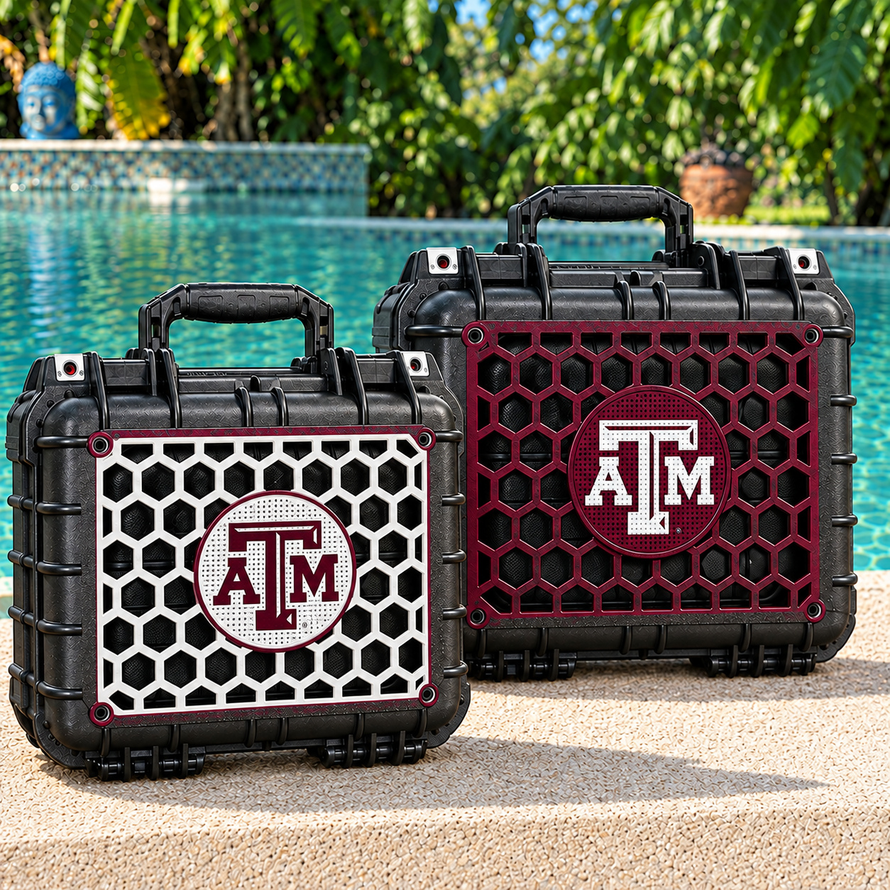 Texas A&M poolside pair: smaller Apache 1800 on the left with a white grill and maroon logo, larger Apache 2800 on the right with a maroon grill and white logo
