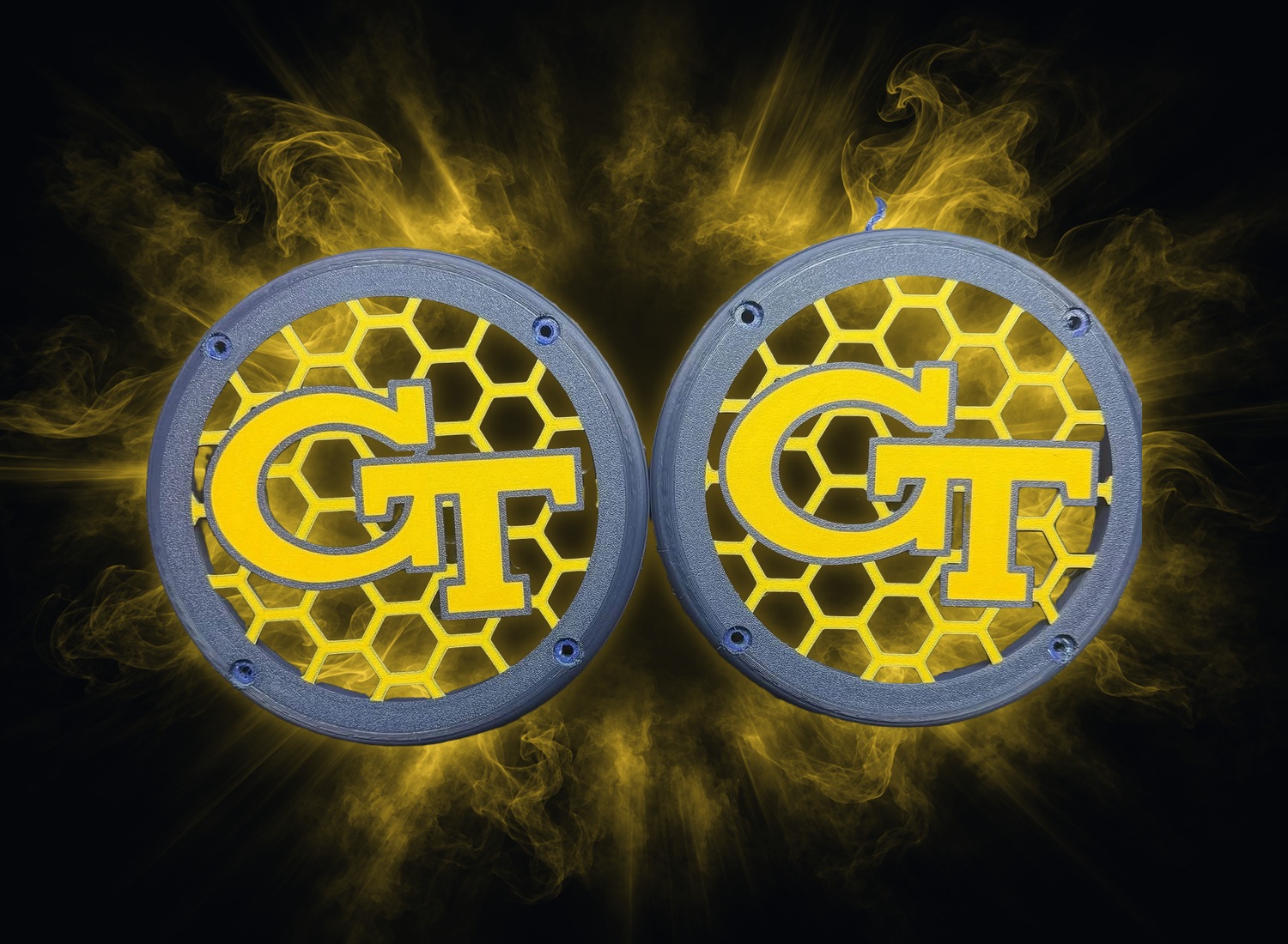 Sample grill 02: pair of navy and gold circular grills with GT lettering